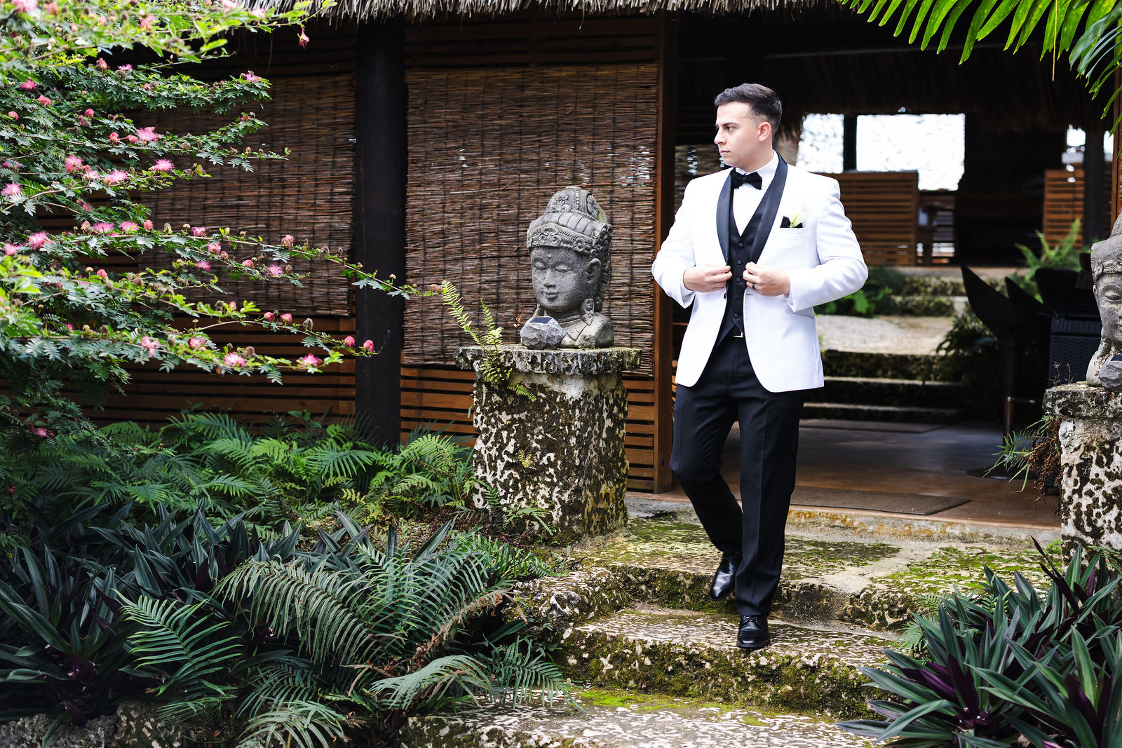 Pablo photographed among the tropical garden architecture