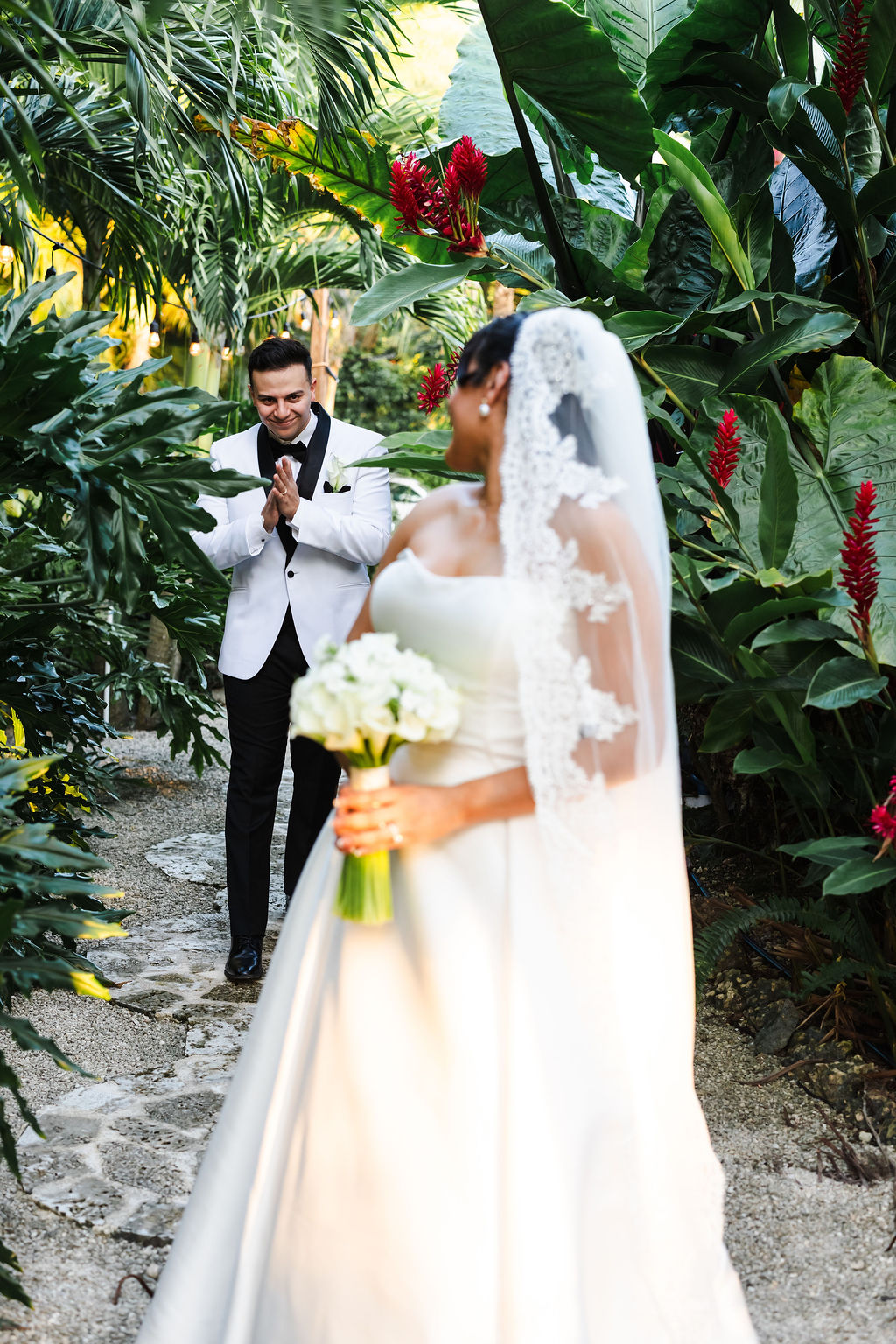 Ana and Pablo together in the colorful tropical garden
