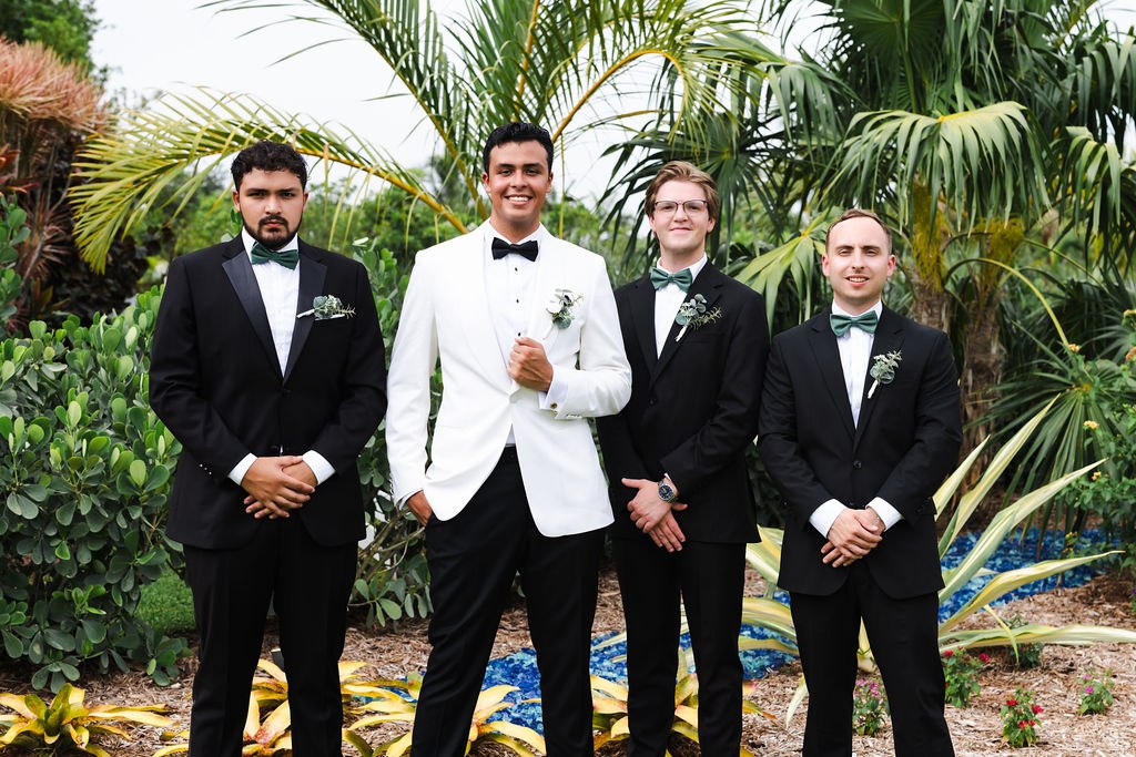 Jose with his wedding party among the estate’s palms