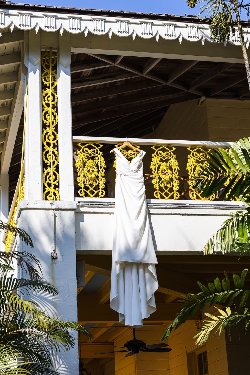 Sara’s wedding dress displayed beside the estate balcony