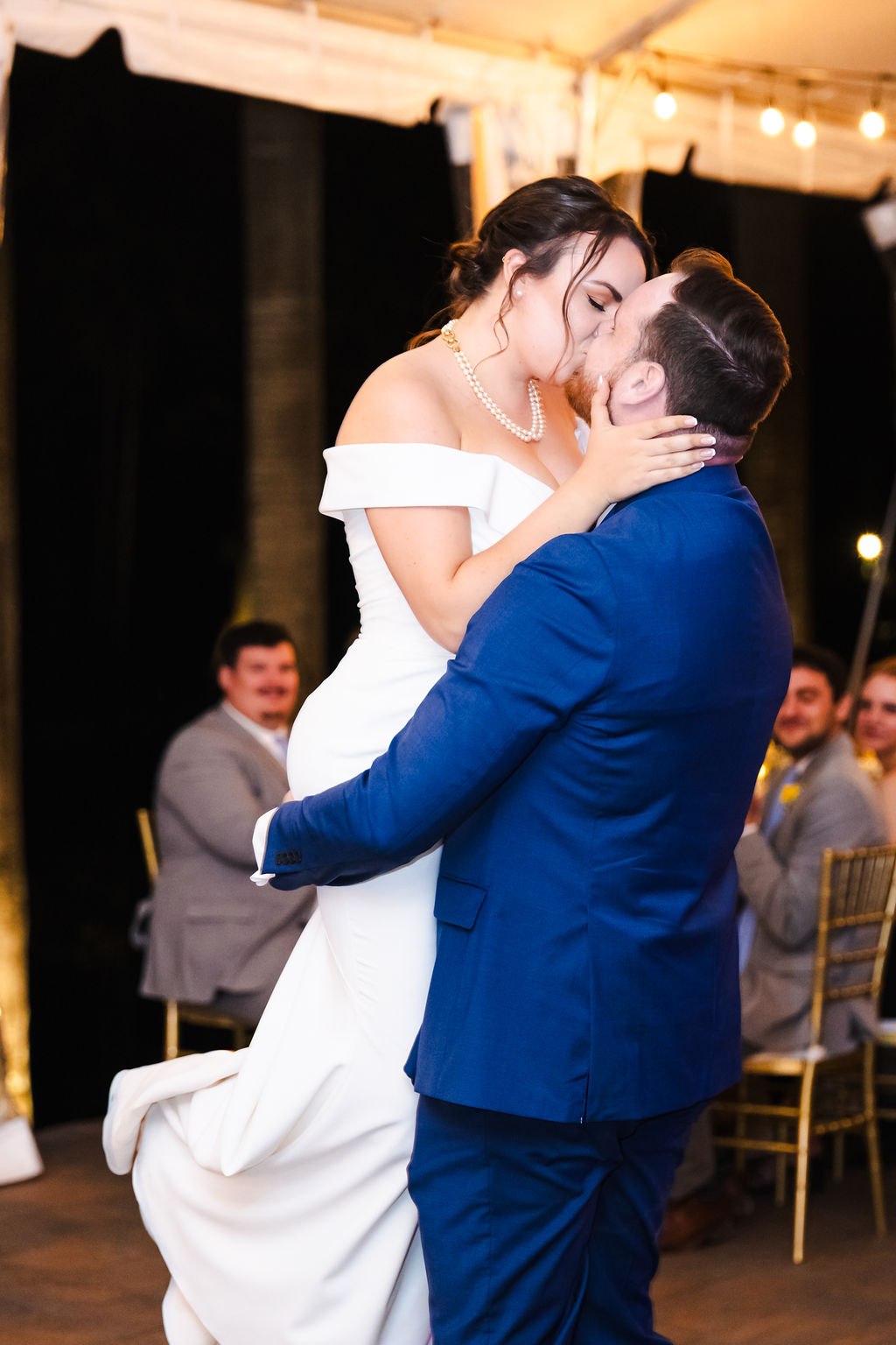 Brett lifting Sara during their first dance