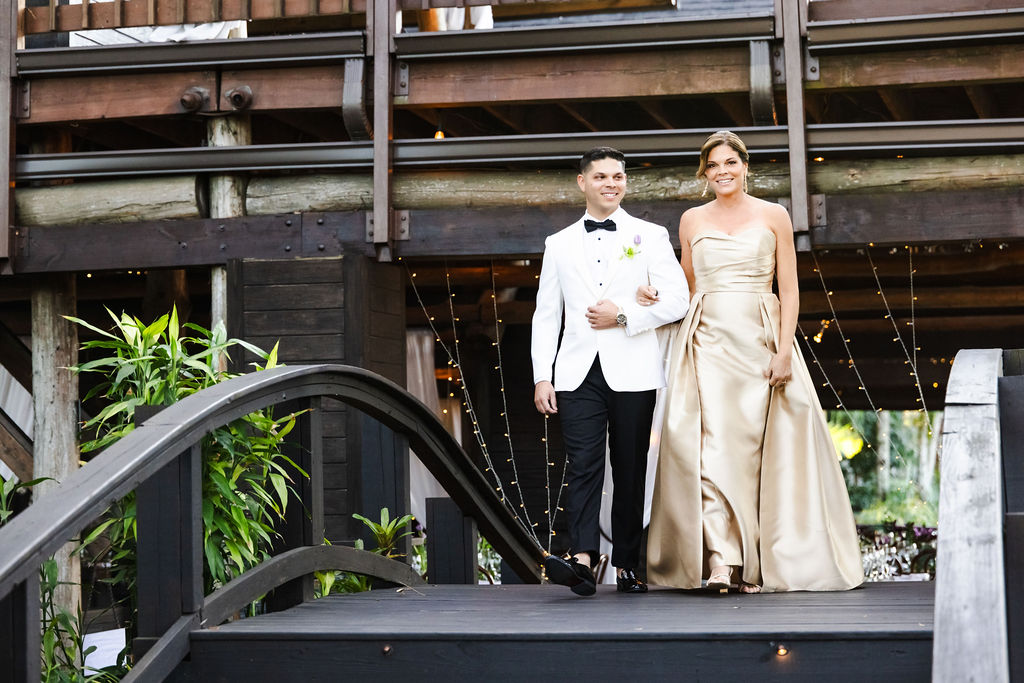 Edward walking toward the ceremony with a family member