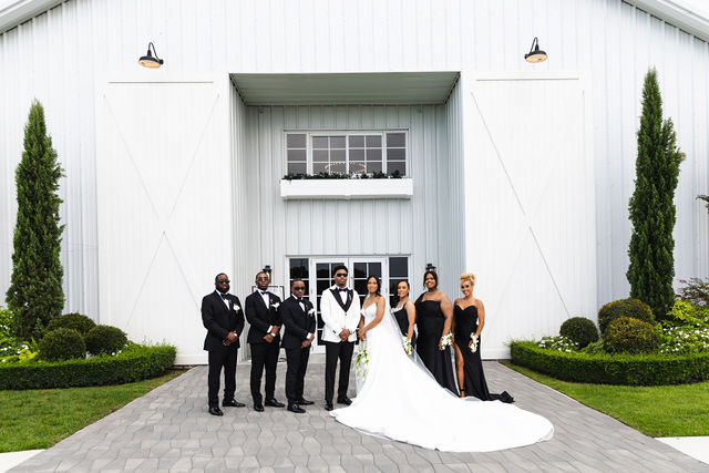 Chrispin and Netania with their full wedding party