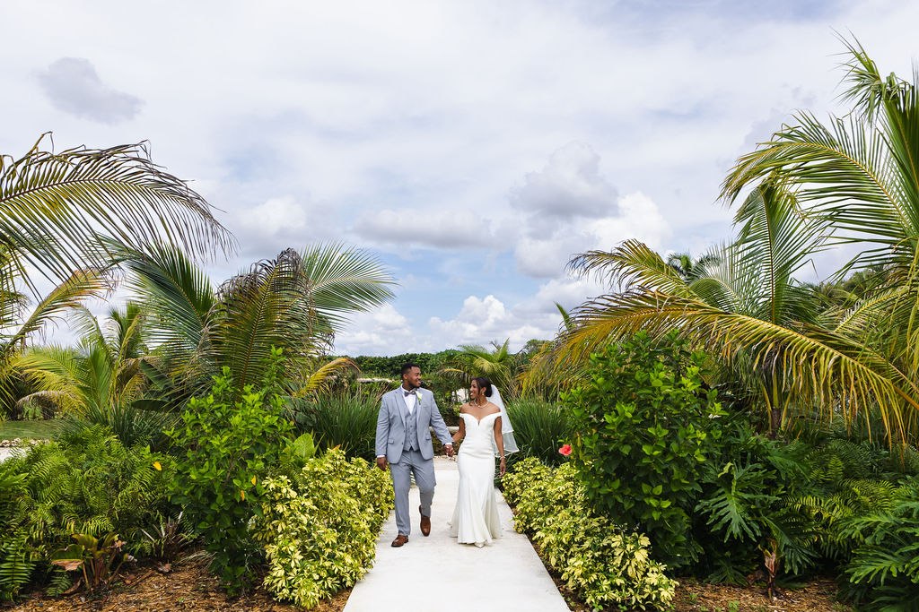 Adrian and Sharlena together beneath the palms