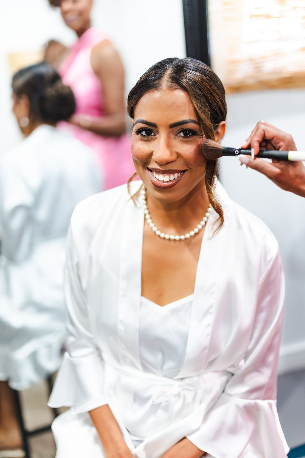 Sharlena having the finishing touches applied before the ceremony