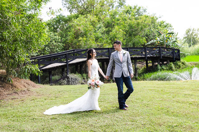 Haley and Trace walking together across the ranch lawn