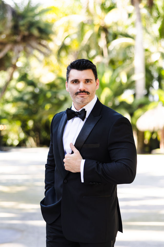 Joe in a classic black tuxedo