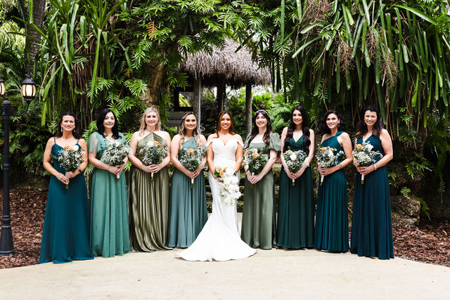 Sarah and her wedding party in the tropical garden