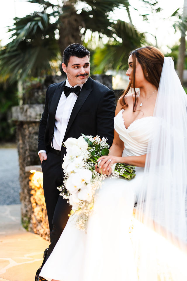 Sarah and Joe smiling together after their ceremony