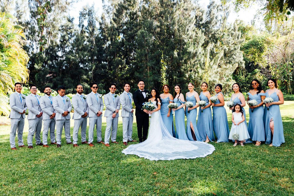 Dao and Karina with their full wedding party on the monastery grounds